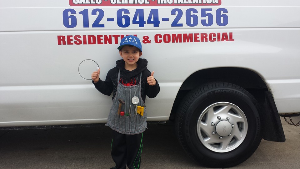 Kid Standing in Front of the Van